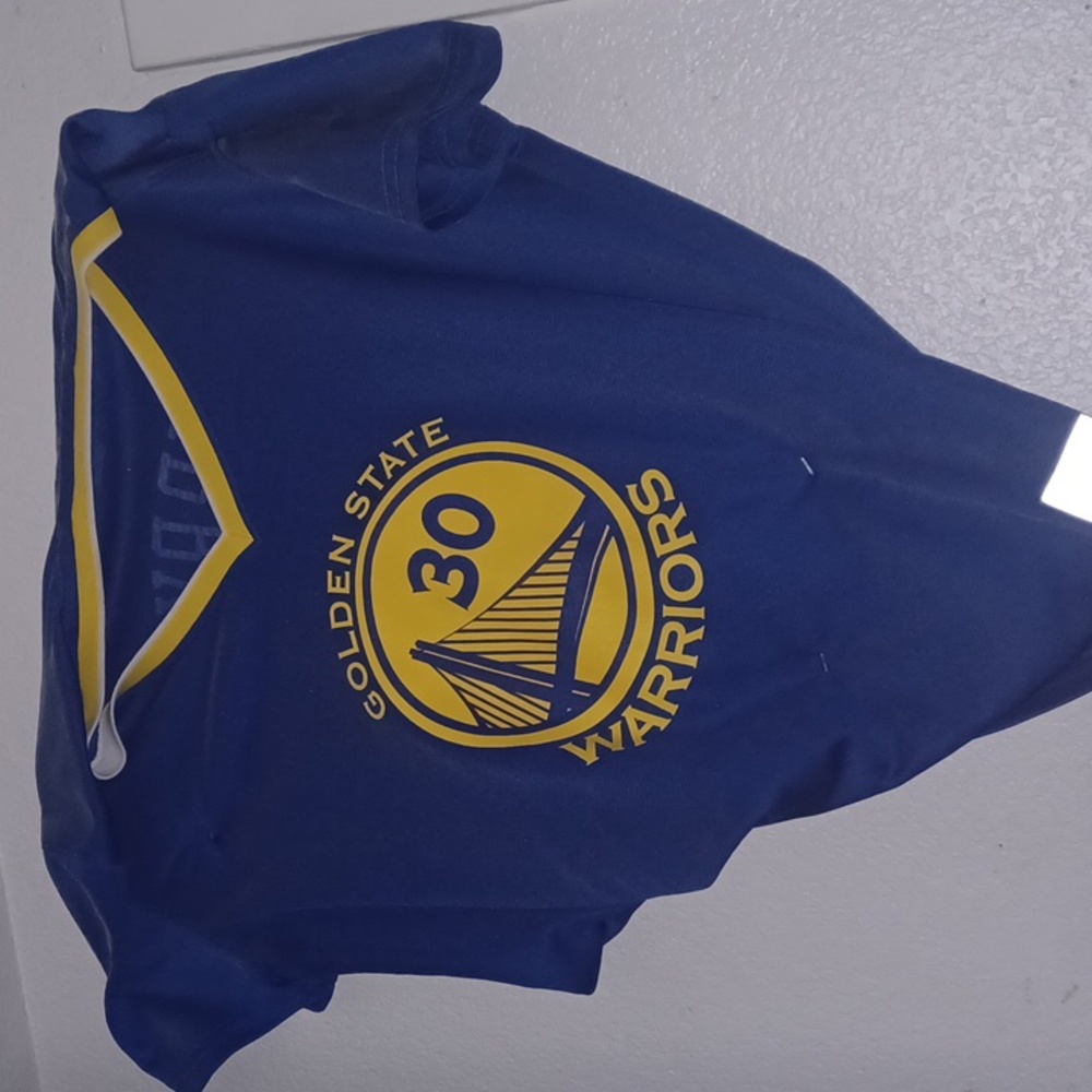Women's size large warriors jersey